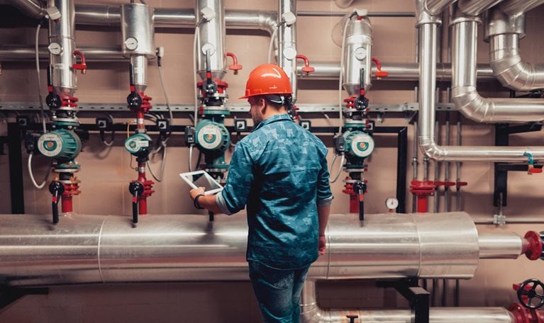 Stationary engineer at work - stock photo