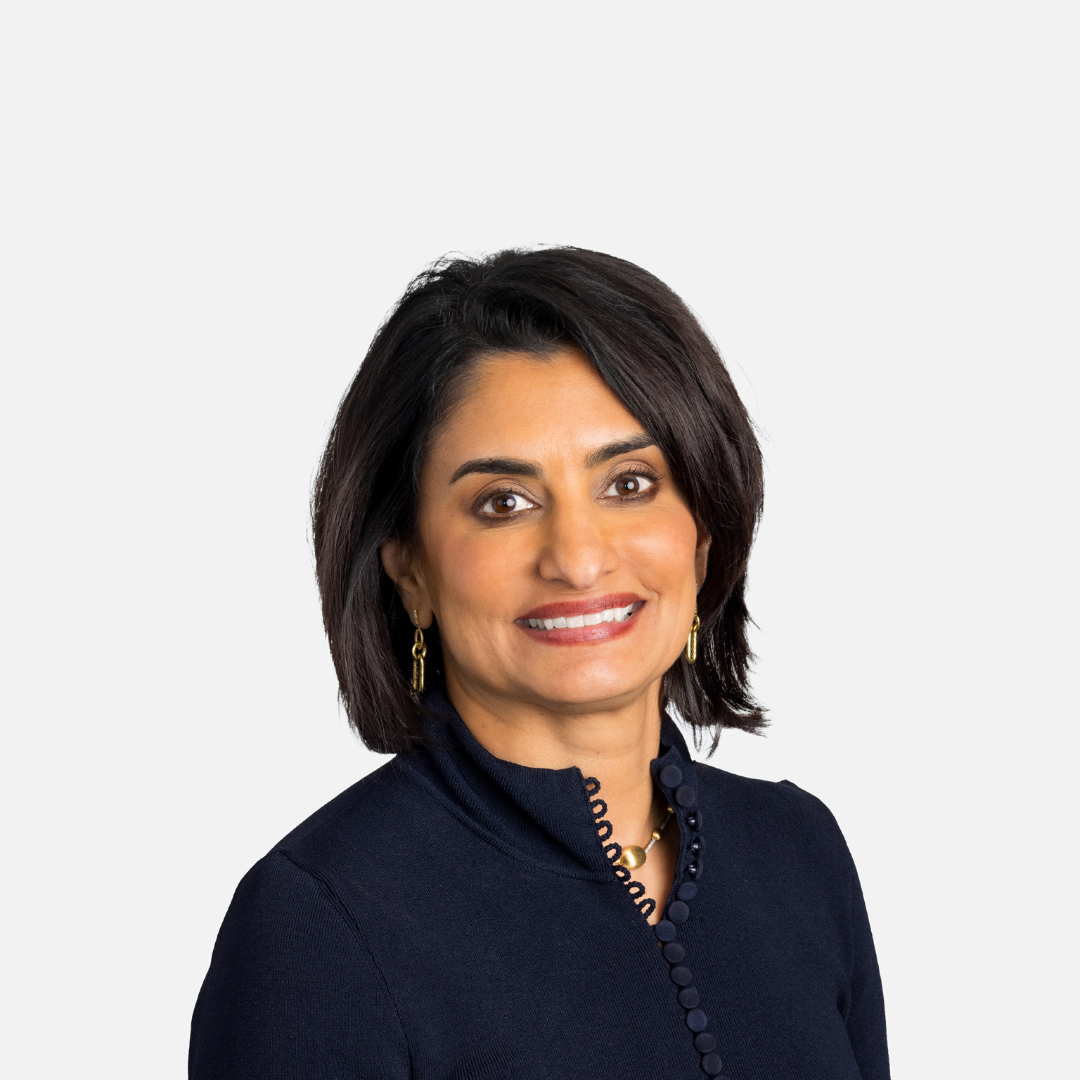 Smiling portrait image of Seema Verma, executive vice president and general manager of Oracle Health and Life Sciences
