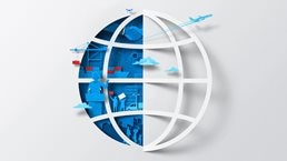 A white sheet of paper has been cut and folded in half, creating the silhouette of a globe. The open space left by the folded paper is filled with blue and red shapes, representing international trade, transportation, and geopolitics.