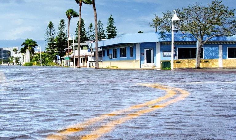 A street in downtown Gulfport, Florida, is flooded by rising waters that are being driven inland by Hurricane Helene from Tampa Bay and the Gulf of Mexico.