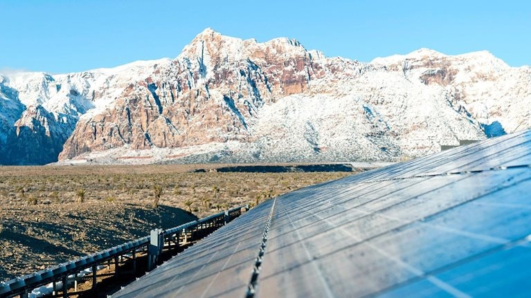 Mountains behind Solar panels
