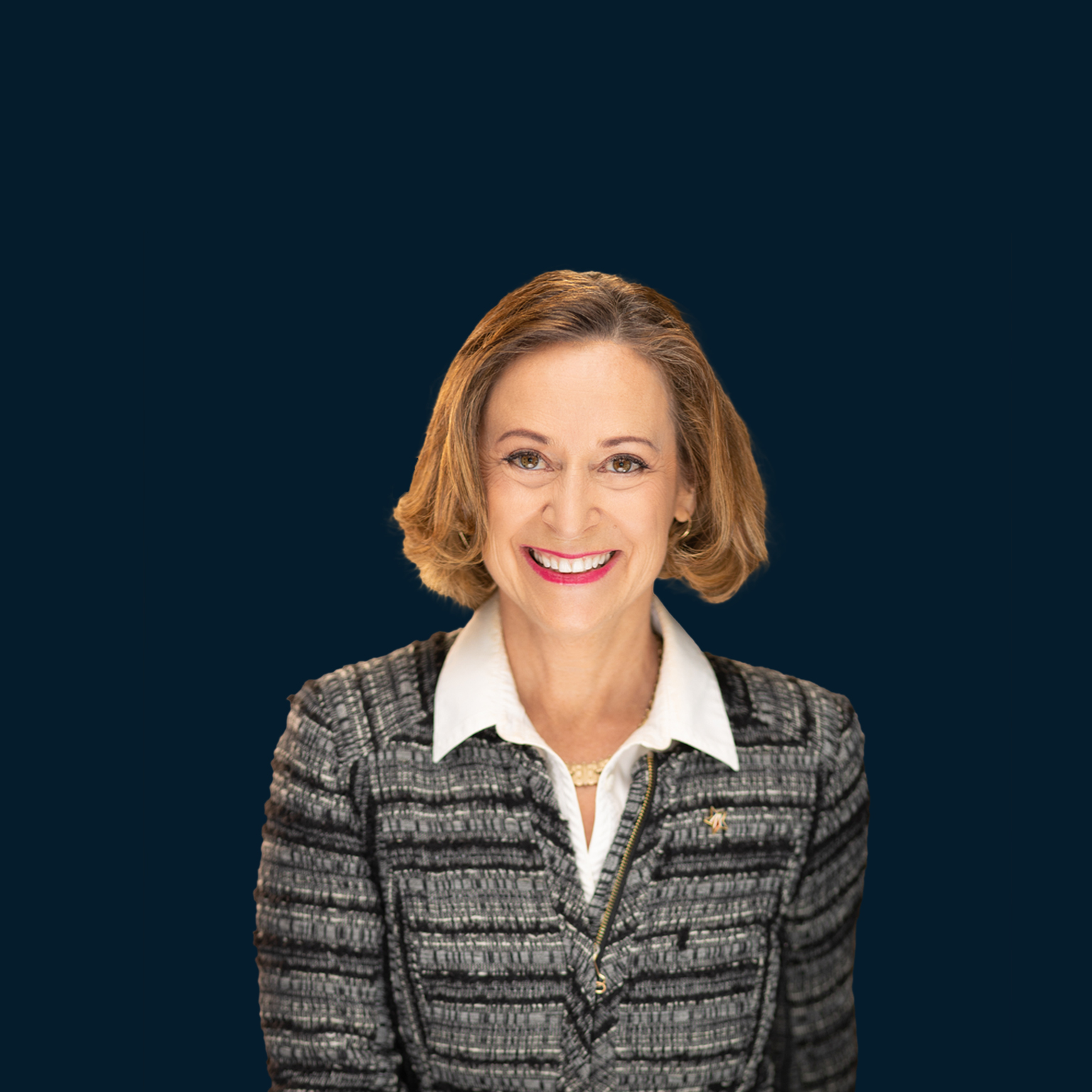 Smiling portrait of Kathy Roth-Douquet founder and CEO of Blue Star Families