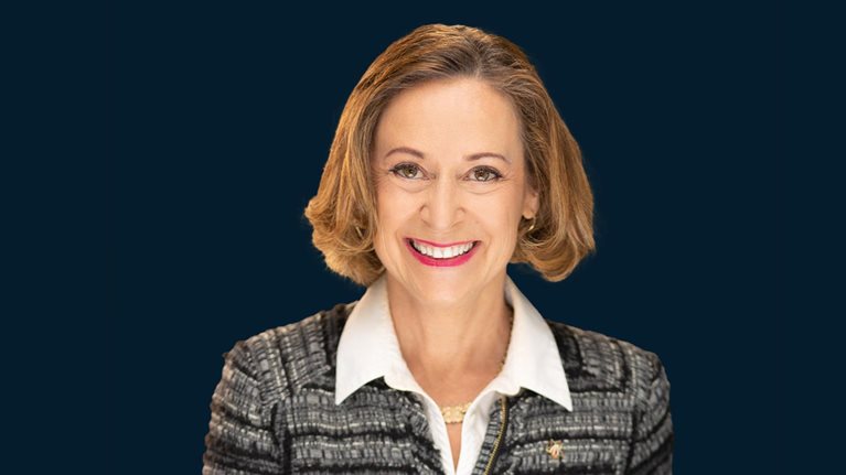 Smiling portrait of Kathy Roth-Douquet founder and CEO of Blue Star Families