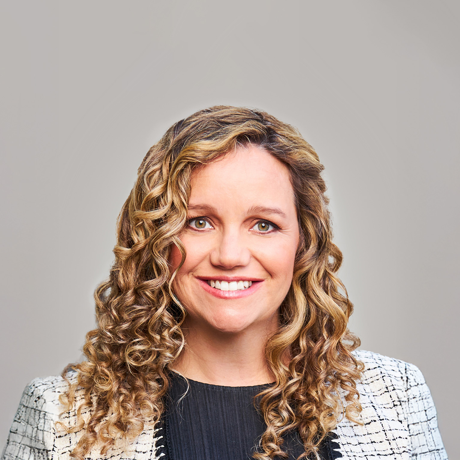 Smiling portrait photo of Laura Hines-Pierce, co-CEO of Hines