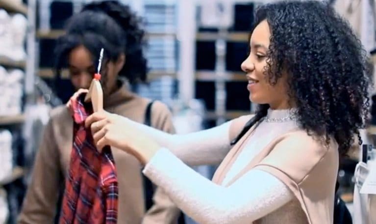 Two women shopping in a department store