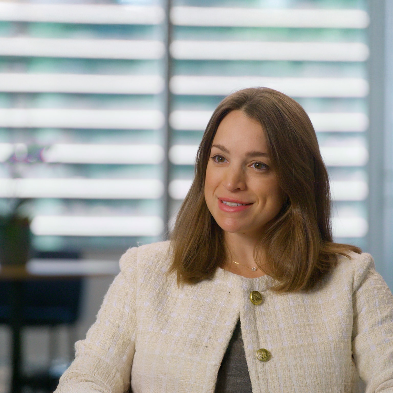 A still image of Katharine Mattox being interviewed.