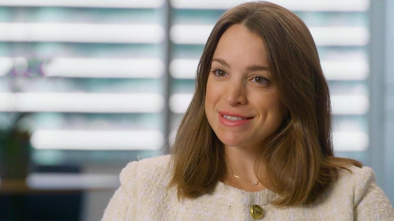 A still image of Katharine Mattox being interviewed.