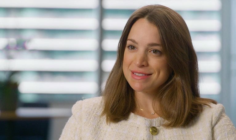 A still image of Katharine Mattox being interviewed.