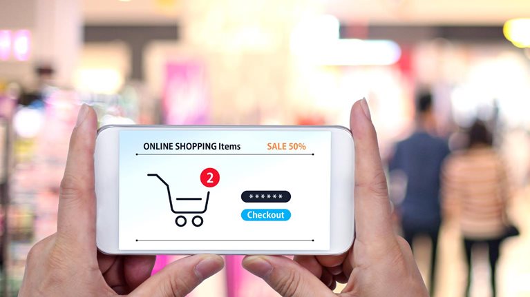 Hand touching mobile screen. online shopping - stock photo