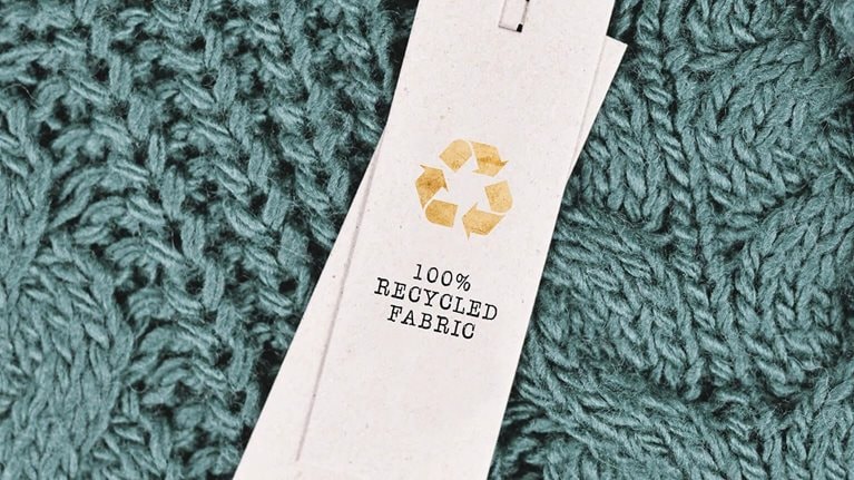 Cotton fabric with label saying '100% recycled fabric'