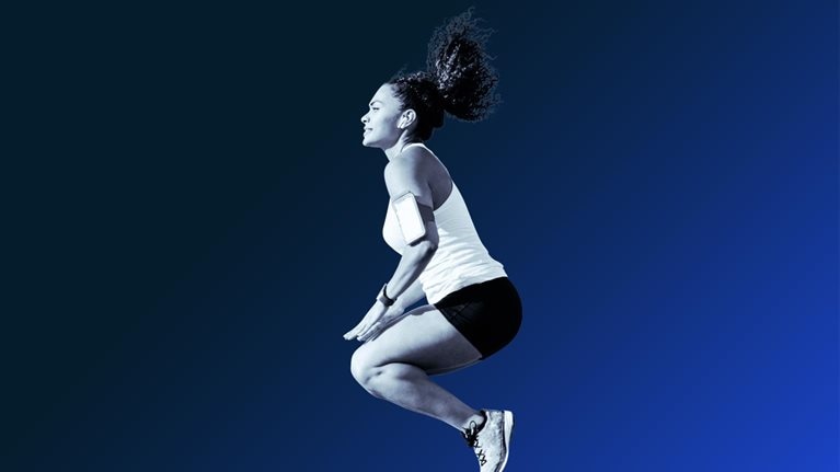 Woman jumping while doing sport.