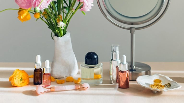 Mirror and cosmetic products on a table