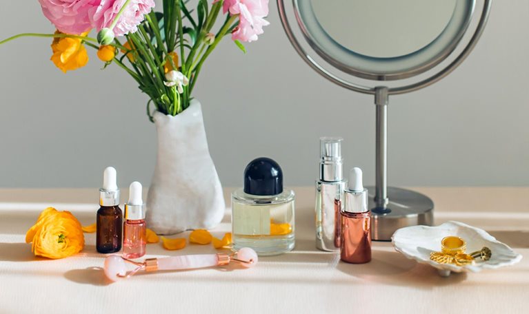 Mirror and cosmetic products on a table