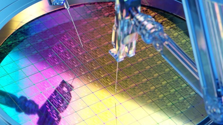 Holographic robot arms making semiconductor