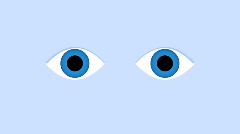 Two minimalist-style eyes on a light blue background. The eyes have white sclera, blue irises, and black pupils, giving them a simple, graphic appearance.