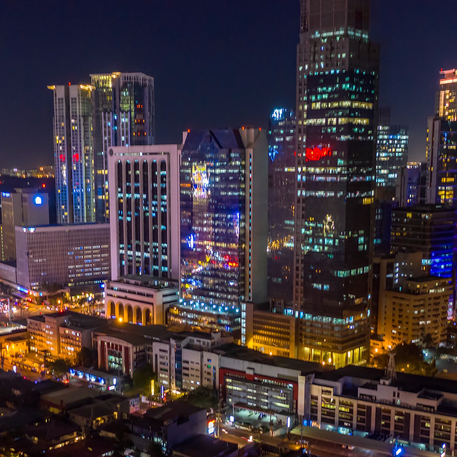 Manila, Philippines Makati timelapse aerial shot of Intersection in central city area with traffic. -  stock video
