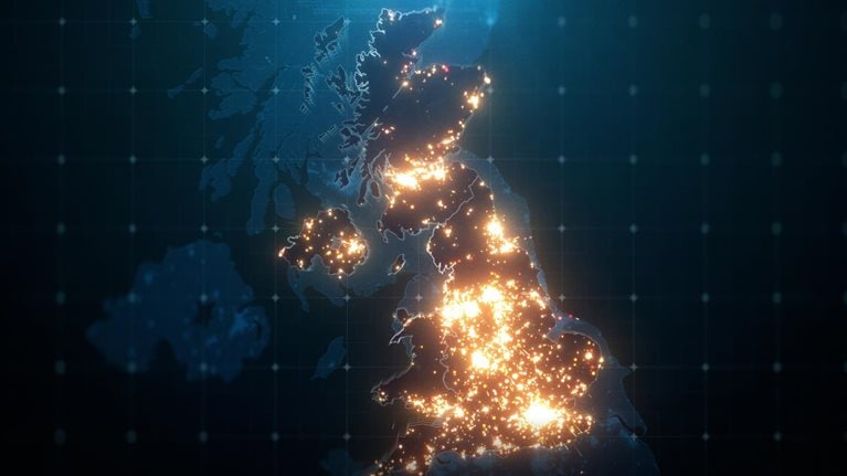 Night map of United Kingdom with city lights illuminated