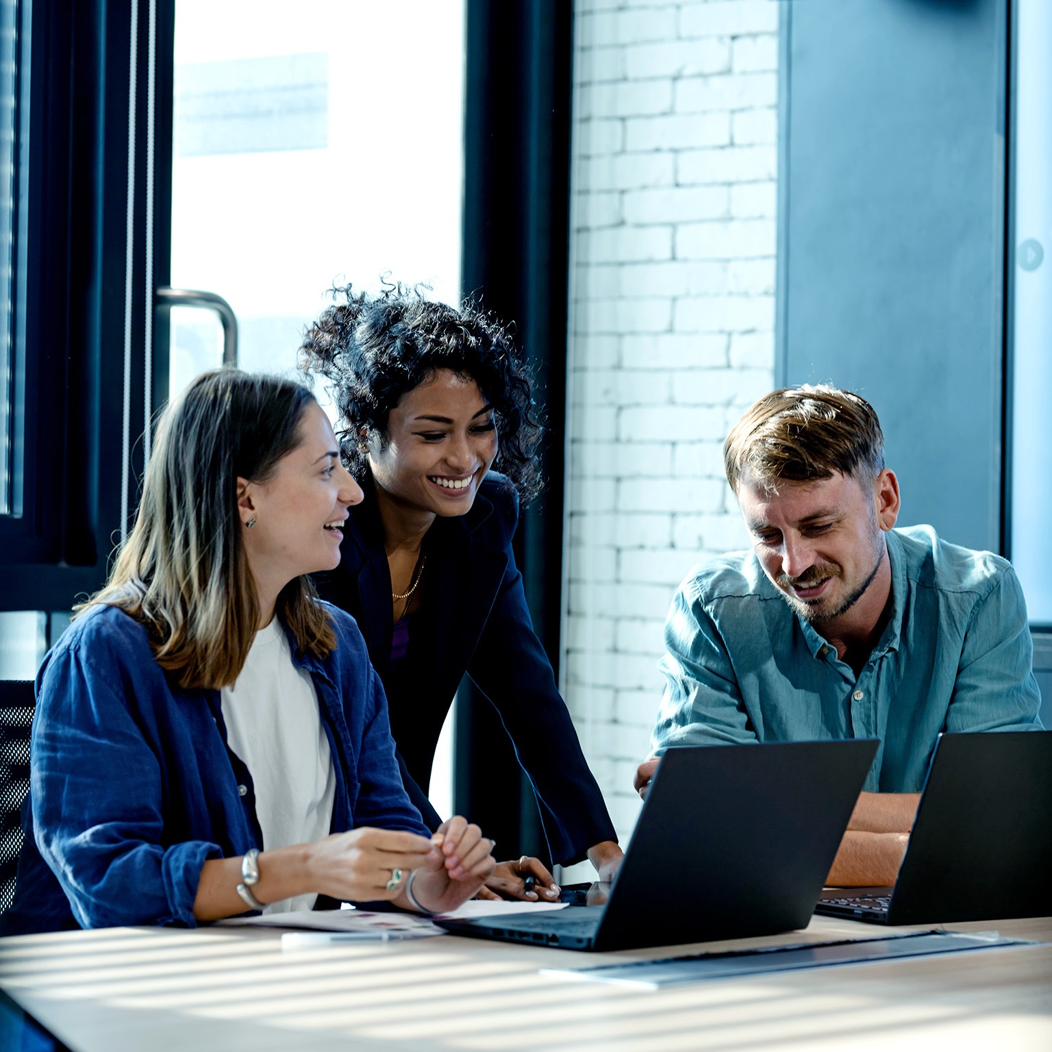 Use Performance Insights To Drive Business Growth. Team of business development is on a data discussion to improve solutions, products, or services during a meeting in a business office. 