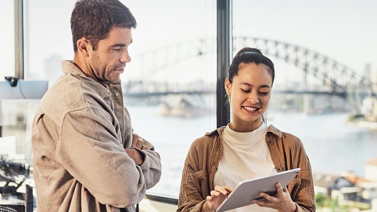 A diverse team of Australian professionals collaborating in a Sydney office.