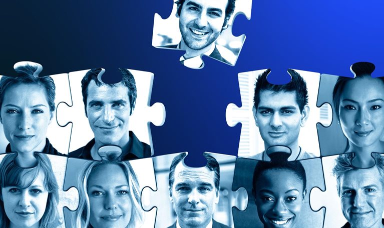 A picture of a puzzle with different faces on each pieces, with a missing piece in the middle and another flying off.