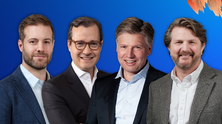 The image features Marc Canal, Nick Leung, Sven Smit, and Chris Bradley, the core authors of the McKinsey Global Institute book titled "A Century of Plenty: A Story of Progress for Generations to Come." They pose together and smile at the camera against a vibrant blue backdrop. Colorful painterly brushstrokes in warm orange and cool teal tones frame the image on either side.