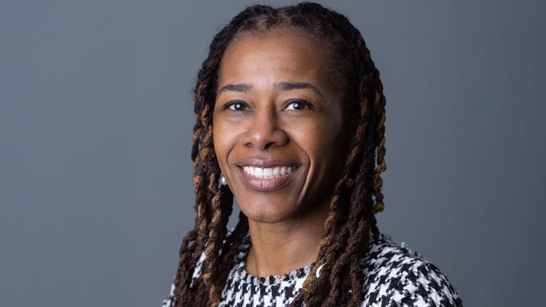 Smiling portrait of Joy Rhoden, senior vice president of Health Outcomes and Care Transformation at the American Hospital Association