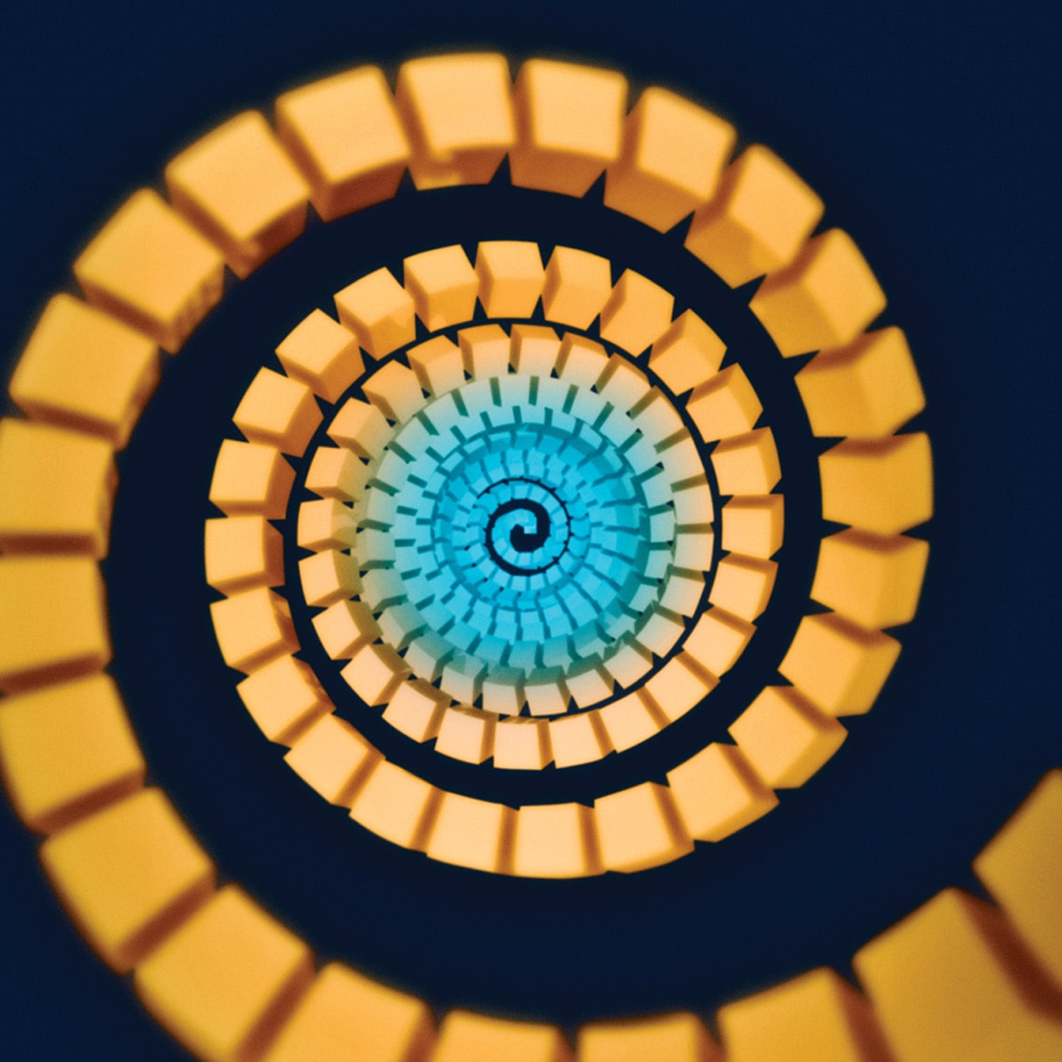 3D render of abstract design of golden stacks spiraling circles