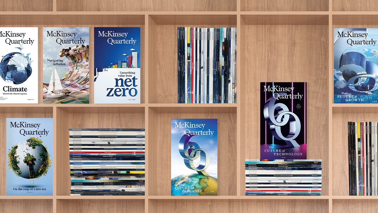 Book shelf featuring past issues of the McKinsey Quarterly birthday editions magazines
