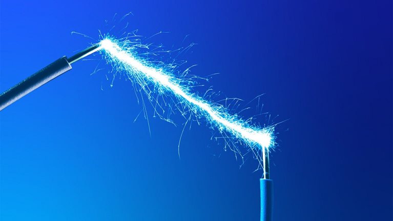 Two power cables connected by a wave of electricity