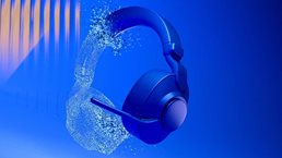 A digital image showing a pair of 3D rendered headphones floating over a multicolored background