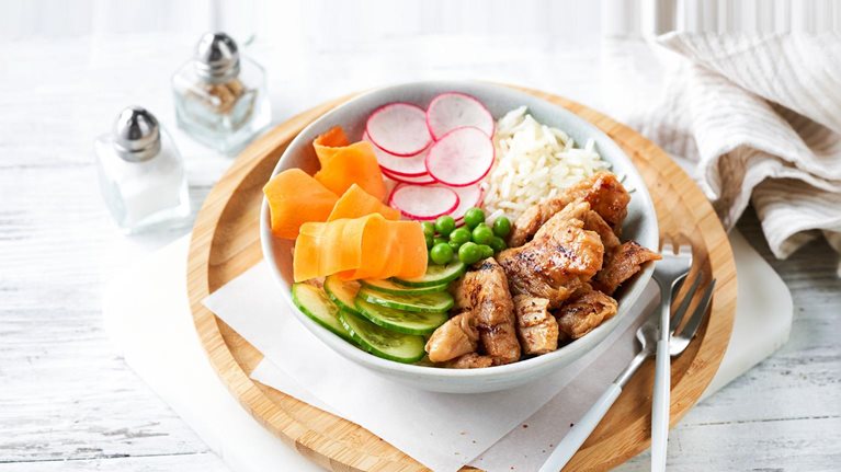 Healthy Vegan Poke bowl salad, heura vegetable protein, vegan chicken with variety vegetables, rice, served in bowl. - stock photo