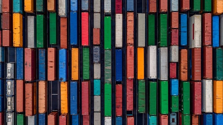Aerial shot directly above multi coloured shipping crates, France - stock photo