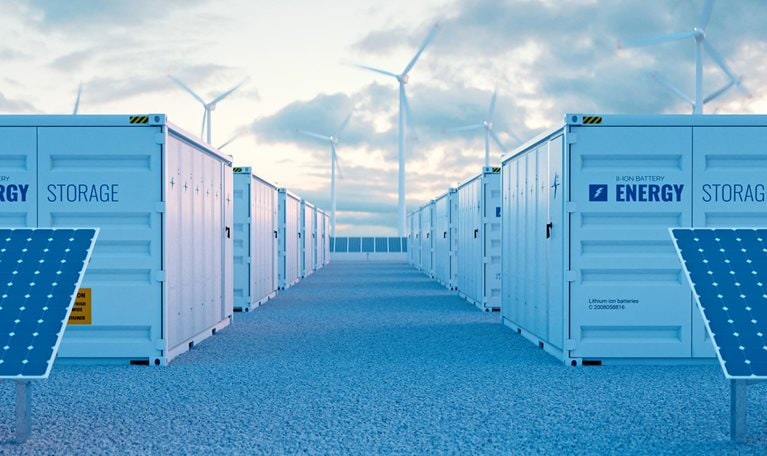 Battery storage power station accompanied by solar and wind turbine power plants.
