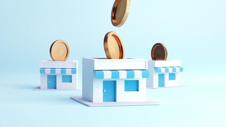 3D image of gold coins falling into small businesses