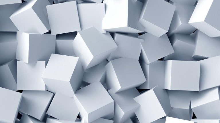 A jumble of identical white cubes.